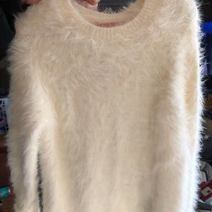 white fuzzy sweater